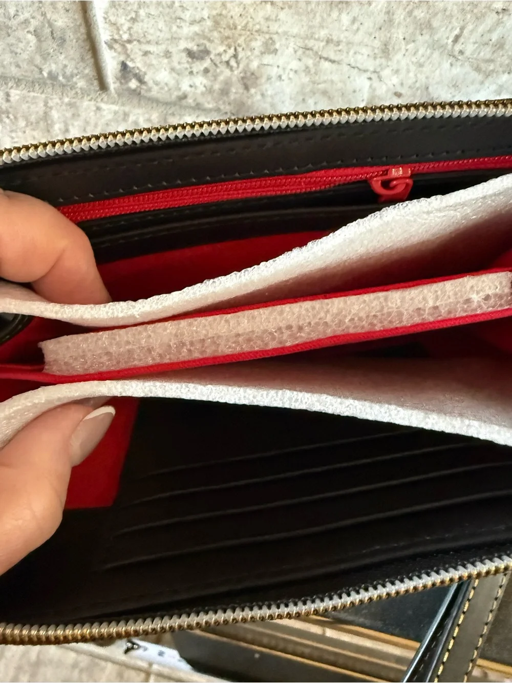 Dooney & Bourke Black Zip-Around Continental Wallet with Logo Patch